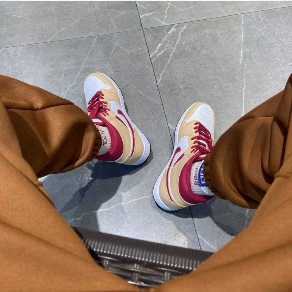 The Air Jordan 1 Mid Light Curry Cardinal